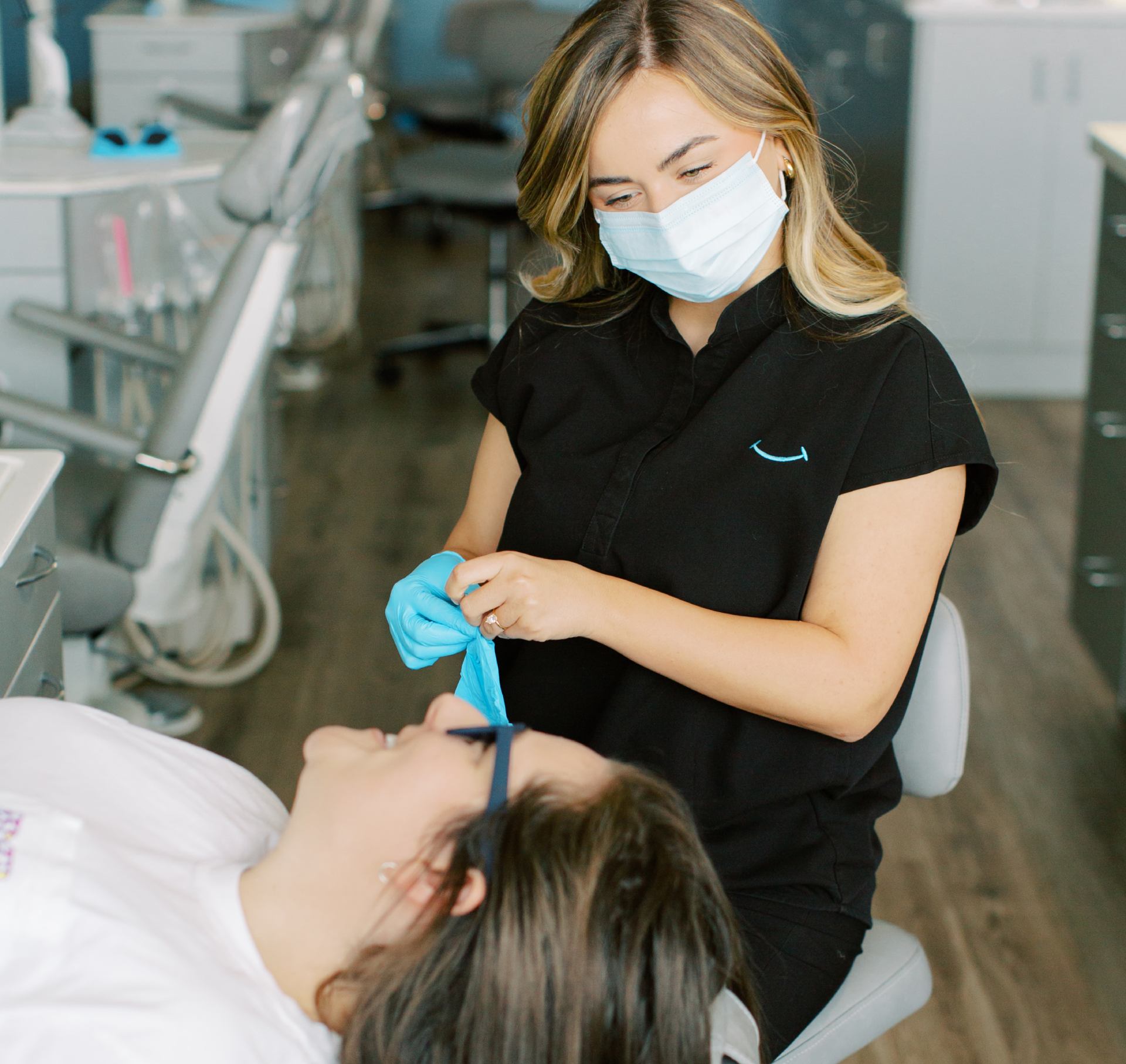 Team member helping patient