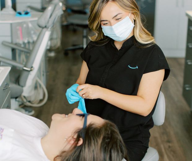 Team member helping patient